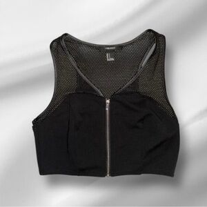 Woman’s black crop top.